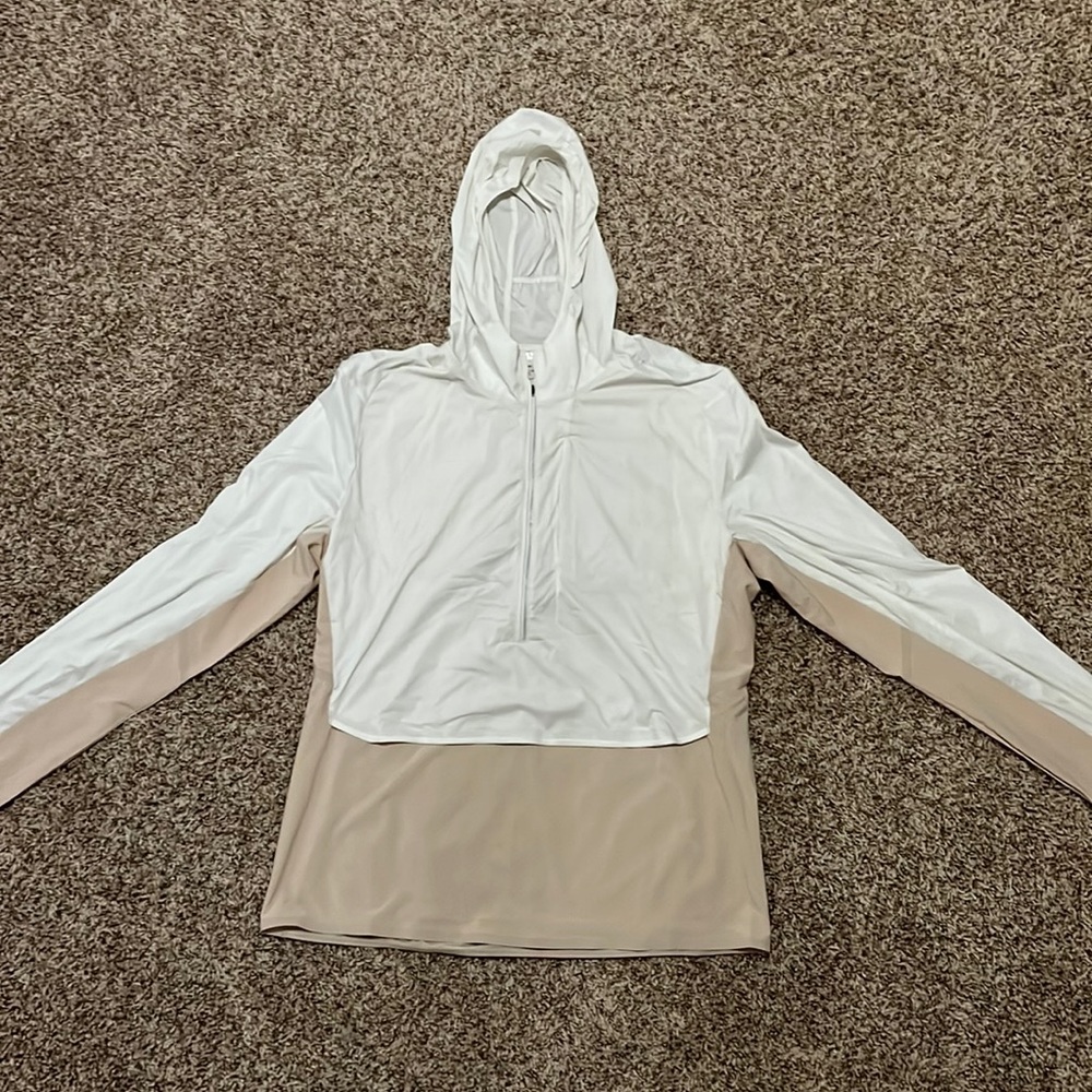 Light weight quarter zip jacket by Lululemon. Size Large. Athletic fit.